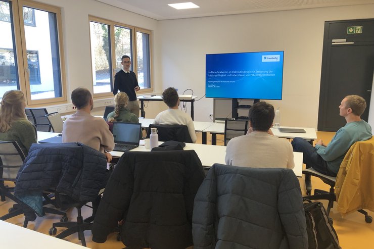 Ein vortragender Promovend während des zweiten Forschungskolloquiums des Promotionszentrums